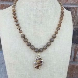 Genuine stone Beaded necklace With Whole Shell Pendant. Great quality item .